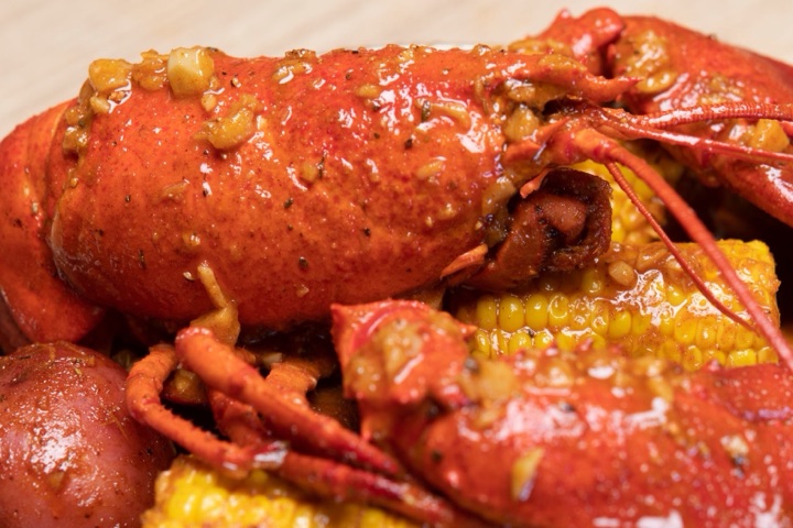 Combo Deal #3: a whole lobster with corn and potatoes in KC sauce.